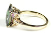 R054, 7ct Mystic Fire Topaz set in a Gold Ring