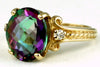 R136, 4.5ct Mystic Fire Topaz set in a Gold Ring with CZ accents