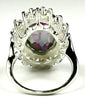SR310, 12ct Mystic Fire Topaz set in a large Sterling SIlver Ring w/ 16 CZ Accents
